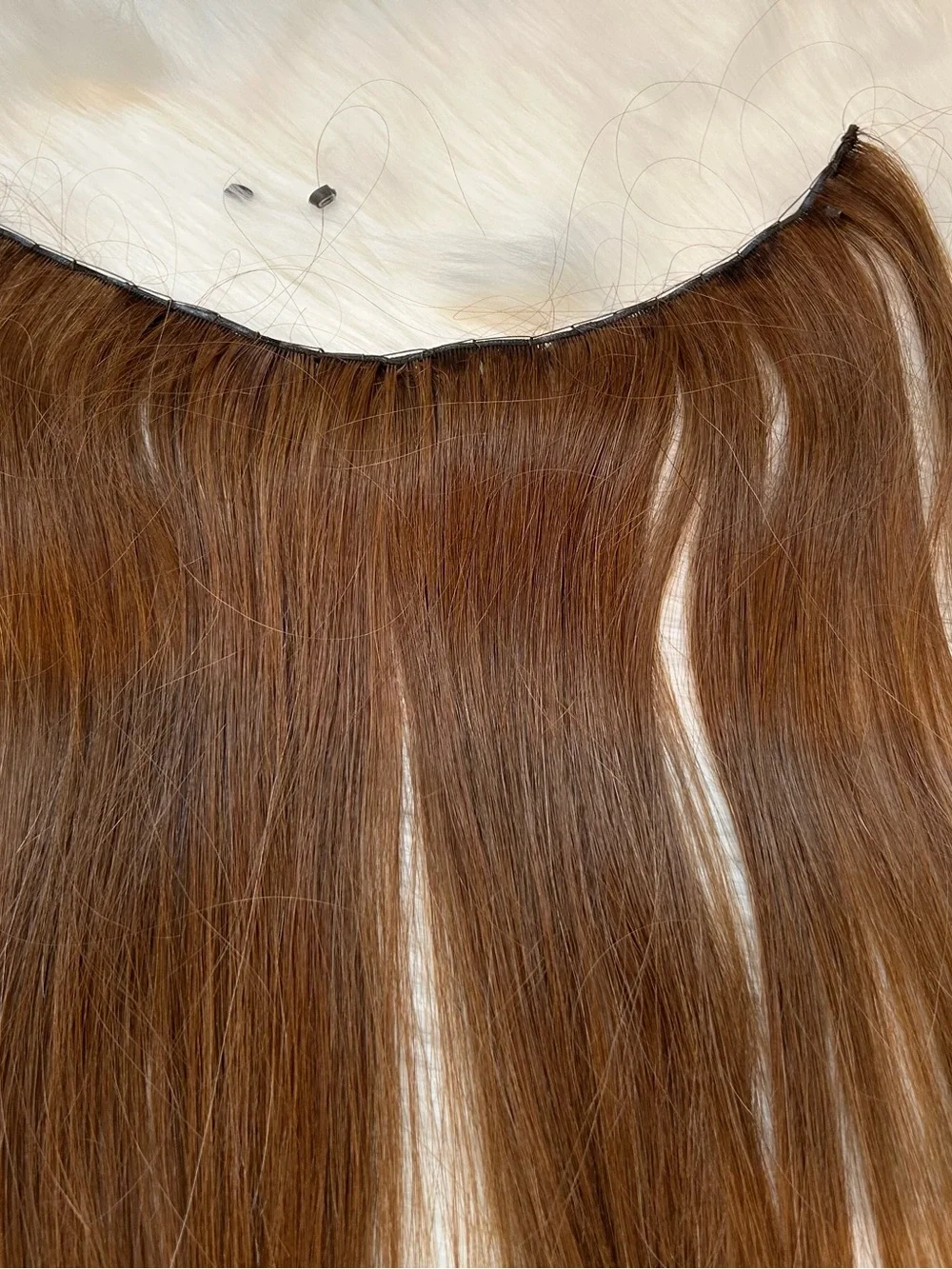 Hair Extensions. 2 rows. Salon quality  20in hand sewn genius weft light brown.